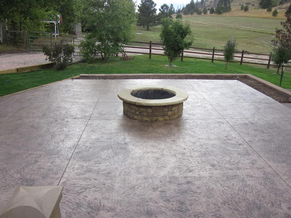 Outdoor Oasis: Designing Patios with Custom Concrete by Co Custom Concrete and Overlays