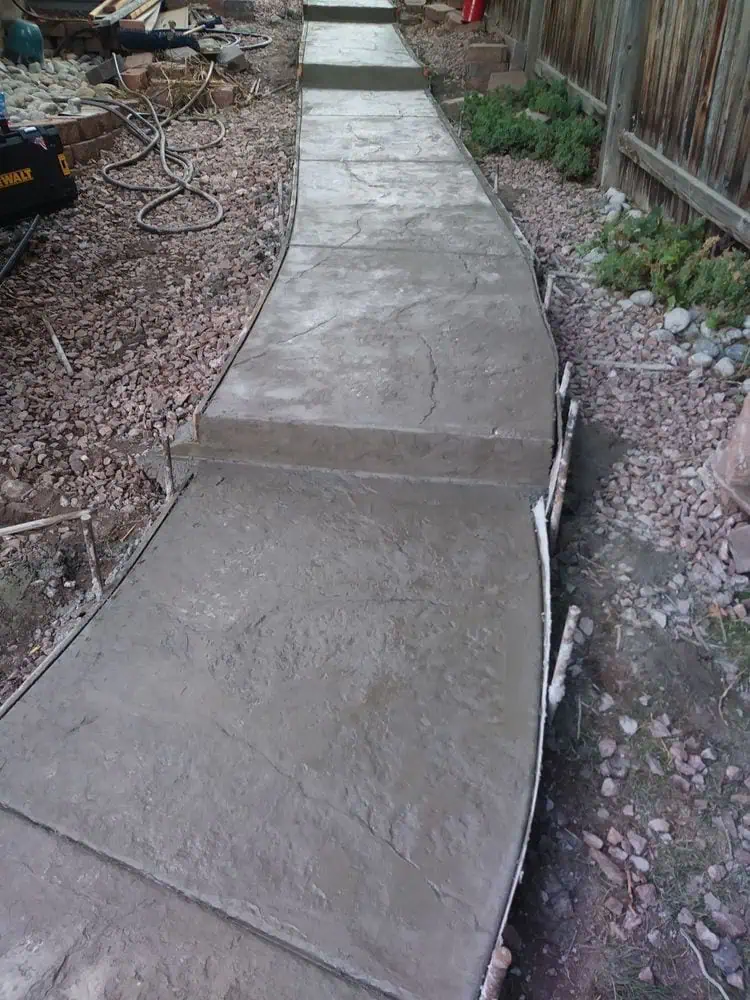 Personalized Elegance: Crafting Unique Walkways with Co Custom Concrete and Overlays
