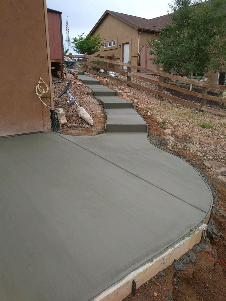 Crafting Bespoke Borders: Customized Concrete Edging by Co Custom Concrete and Overlays