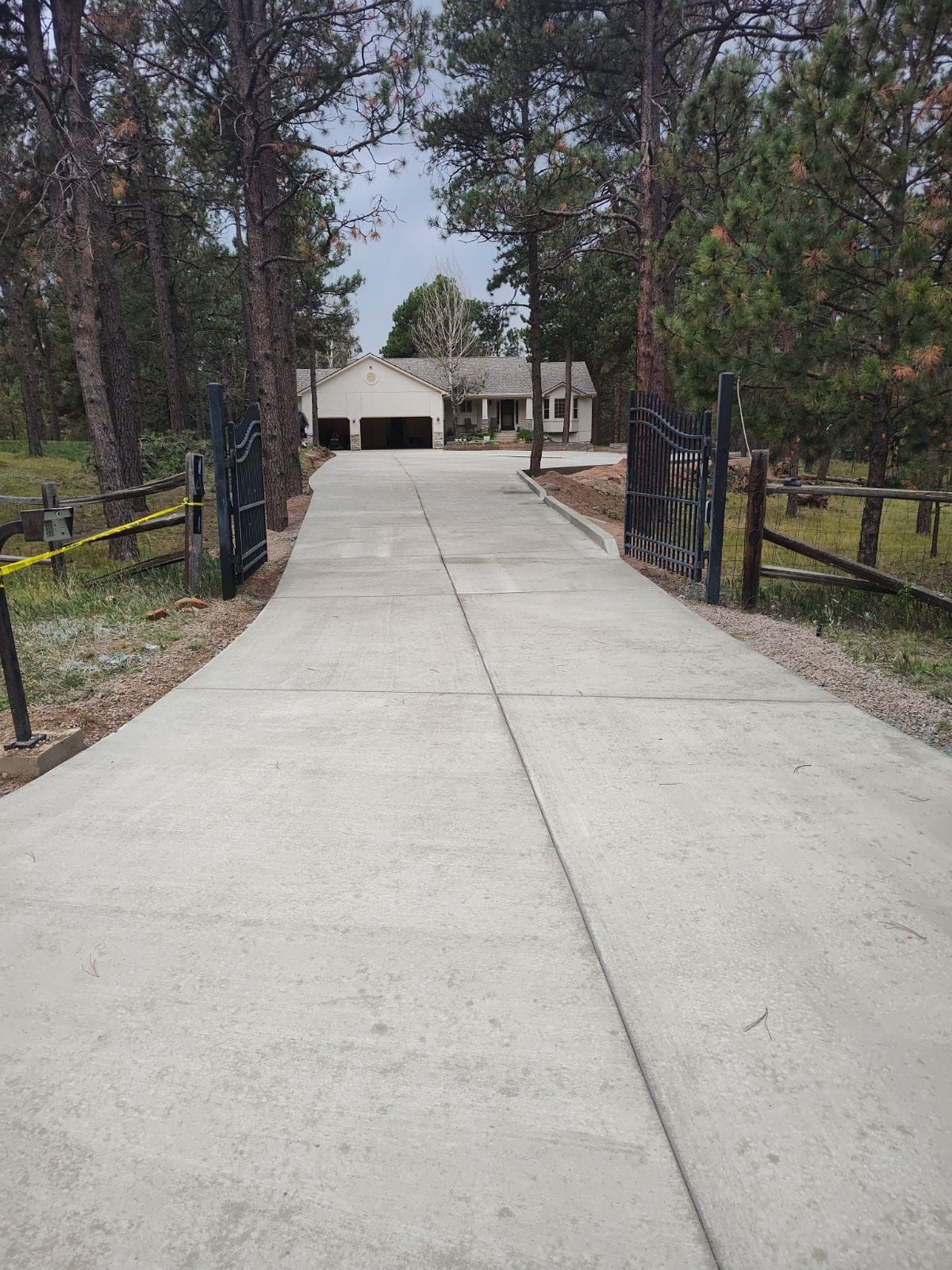 Cold Climate Solutions: Durable Concrete Driveways by Co Custom Concrete and Overlays